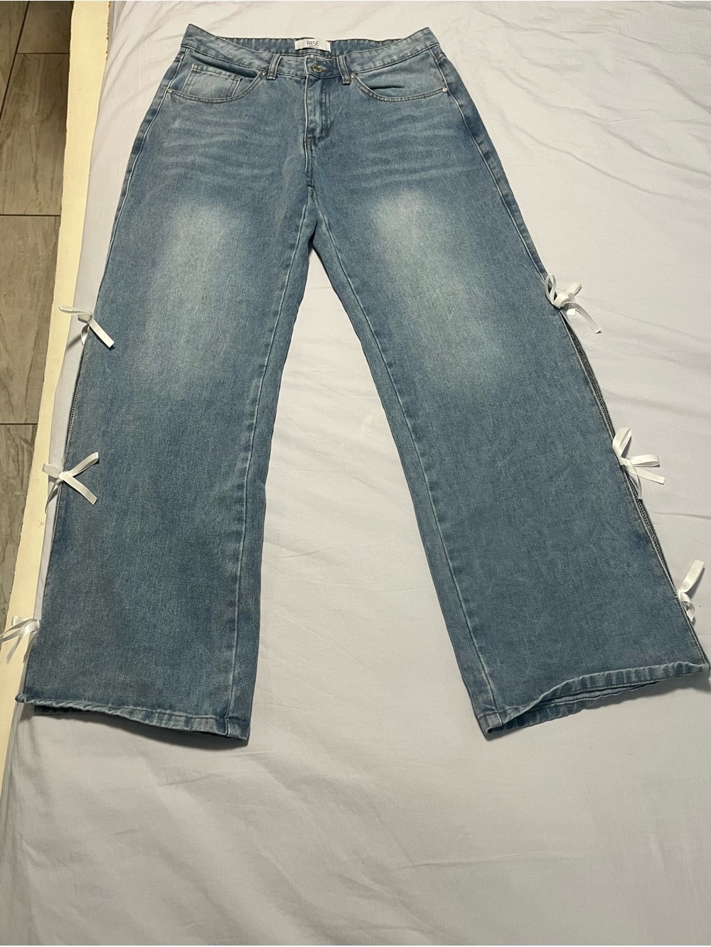 Light Wash Blue Wide Leg Jeans with Side Bow Details